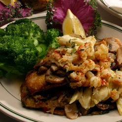 image of a seafood dish from Poor Boy's Riverside Inn cajun restaurant - Great Seafood